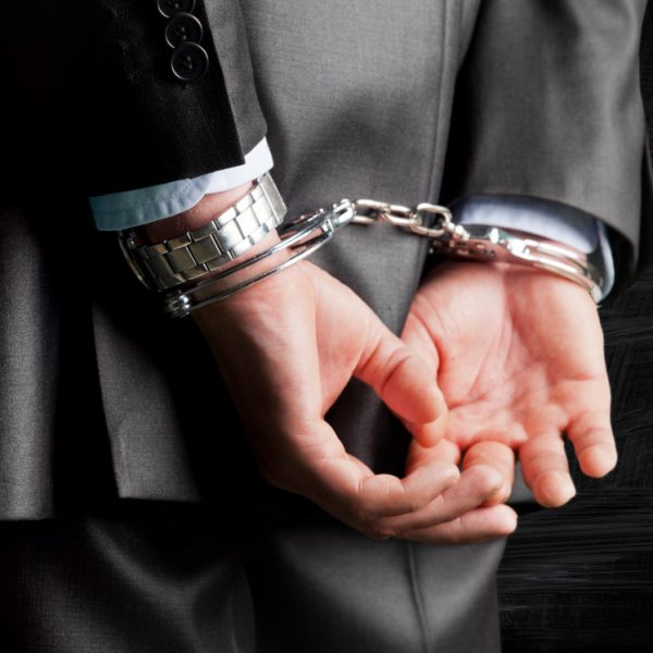 handcuffed person